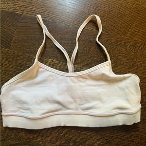 Lululemon old style sports bra. Baby pink with white stripes. Good condition